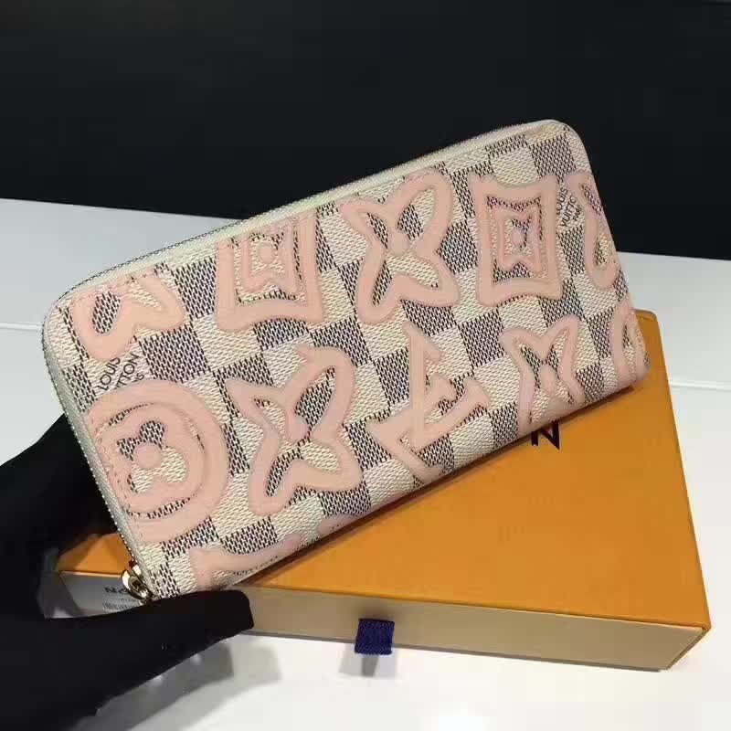 zippy wallet , white leather with damier flower