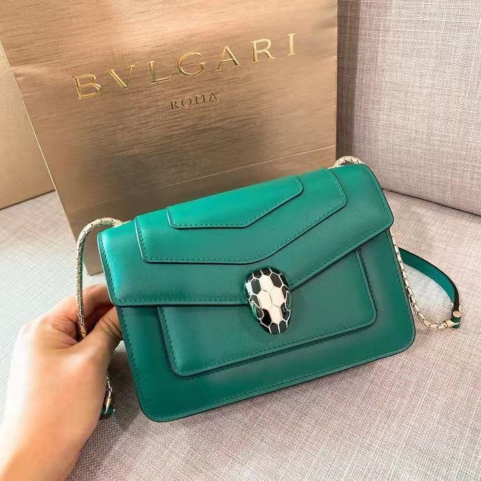 Serpenti Forever , green leather with gold hardware